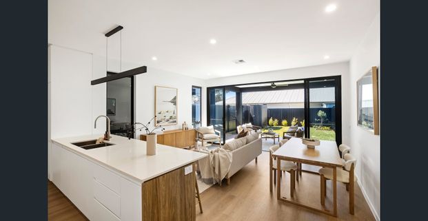 Beachside Living and Modern Convenience 3 Bedroom Home - Photo 1