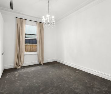 Architecturally Renovated Victorian Masterpiece in Prime Location - Photo 2