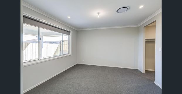 Large Modern Family Home in Everleigh Estate - Photo 1