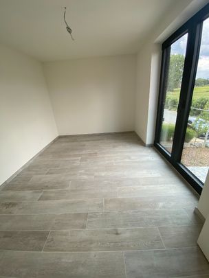 Prachtig halfopen nieuwbouwwoning met tuin en terras - Photo 1