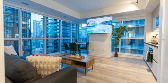 Bright & Spacious Corner Suite with Stunning Views in King West - Photo 2