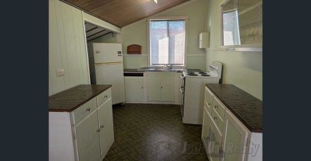 Affordable Seaside Cottage – One Block from the Waterfront - Photo 4