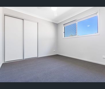 Family Haven with Bushland Backdrop and Modern Living! - Photo 6