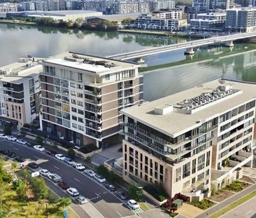 A modern waterfront townhouse with sweeping views and unbeatable co... - Photo 3