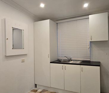 NEAT & TIDY STUDIO WITH OWN PARKING FOR RENT - Photo 4