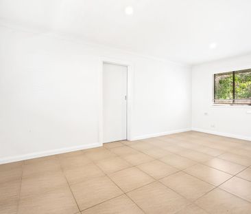 Two Bedroom Home with Spacious Yard and Double Garage - Photo 6