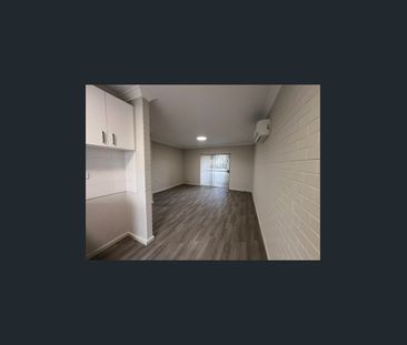 RENOVATED 2 BEDROOM UNIT - INSPECTION WILL IMPRESS ! - Photo 1