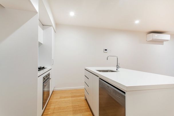 Practical and Modern 2 Bedroom Apartment! - Photo 1