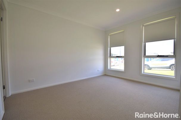 Stylish 4-Bedroom Home Designed for Comfort & Convenience - Photo 1