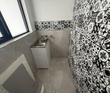 Modern & Conveniently Located Renovated 2-Bedroom Unit - Photo 3
