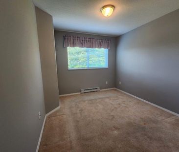 Spacious Two Bed Condo in Langley with Parking and Storage - Photo 1