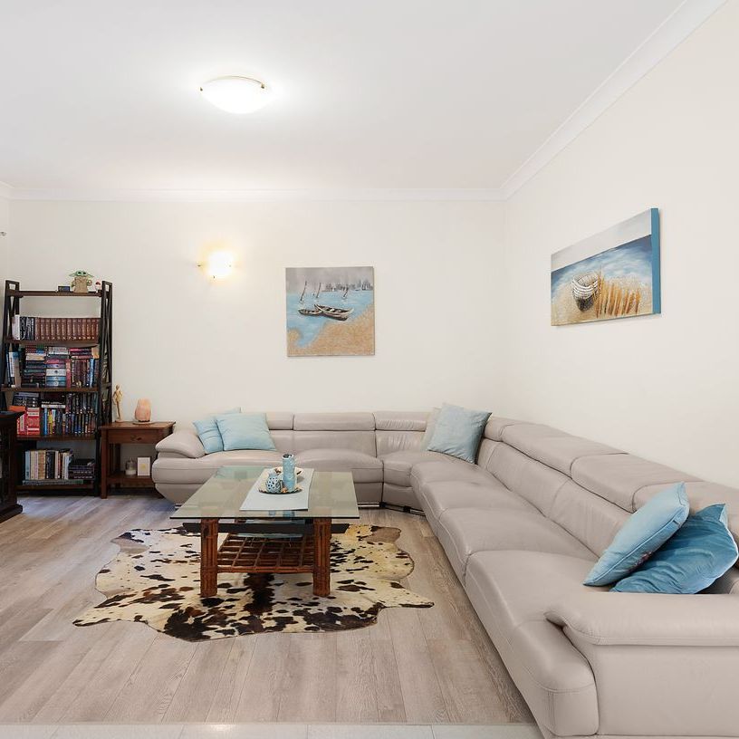 Spacious Four Bedroom Townhouse in Convenient Location - Photo 1