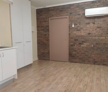 NEAT & AFFORDABLE - WATER INCLUDED - Photo 6