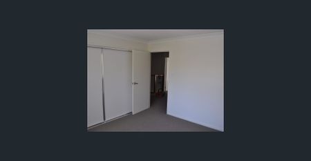 3 Level townhouse with large tandem garage - Photo 2