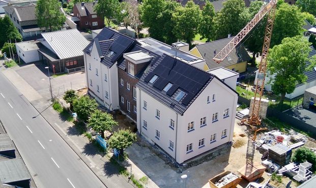 Ein architektonisches Highlight: Wohnen im historischen Schulgebäude mit modernster Technik! - Photo 1