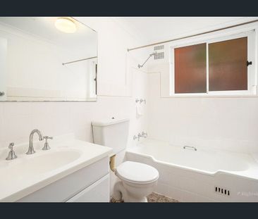 Coastal Two Bedroom Apartment with Balcony and Parking - Photo 4