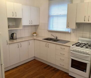 NEAT FAMILY HOME - Photo 4