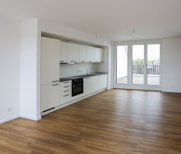 Dachgeschosswohnung mit großzügiger Terrasse - 3 Zimmer auf über 90... - Foto 2