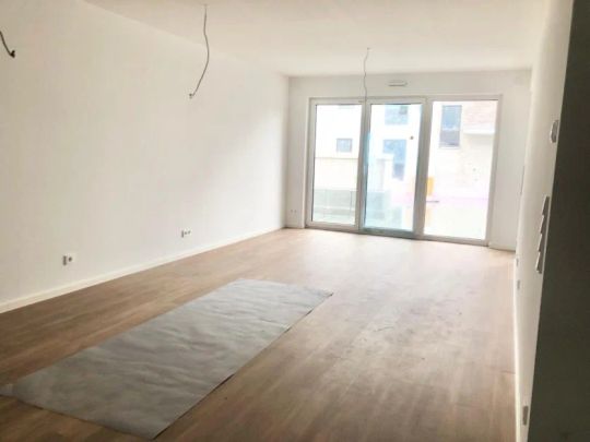 Neubau Erstbezug! Bezaubernde Single-/Pärchenwohnung mit Garten! - Foto 1