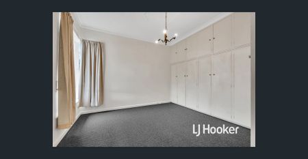 UPDATED 3 BR HOME WITH HUGE RUMPUS ROOM, & HEAT & COOL! - Photo 4