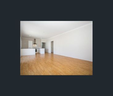 Coastal Comfort: Your Family Home Steps Away from the Beach! - Photo 2