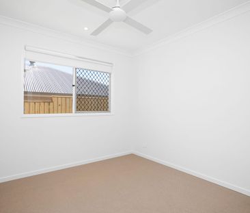 Spacious 4-Bedroom Home in the Heart of Redbank Plains! - Photo 4