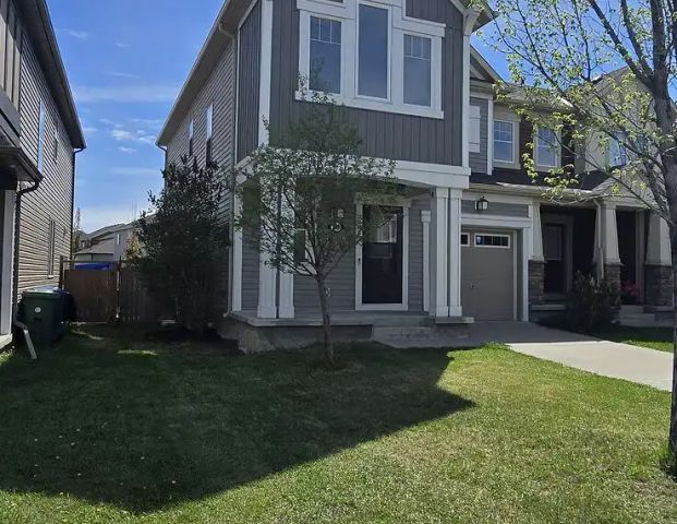 Corner Townhouse by the Lake — 3 Bedrooms+ Den Townhouse - Photo 1