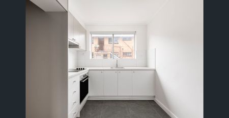 Stylish Two-Bedroom Living in a Convenient Location - Photo 4