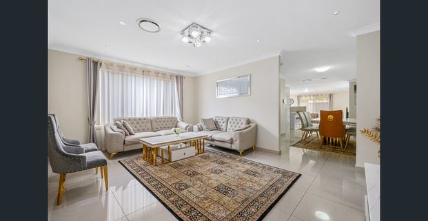 Modern 4-Bedroom Duplex in the Heart of Mount Druitt 750m to Mount Druitt Train Station - Photo 1