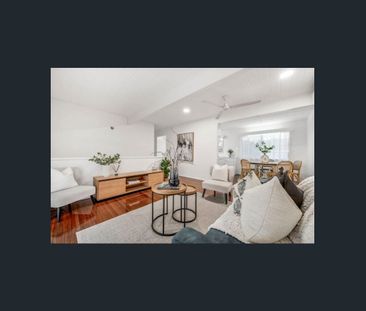 Elevated Comfort with Extra Living Below – Rent This Condon Gem Today! - Photo 1