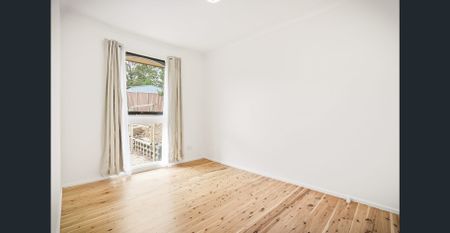 Spacious Family Home with Modern Updates & Self-Contained Retreat! - Photo 5