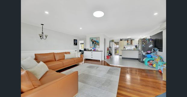 Spacious Family Home with Expansive Deck, Large Backyard & Prime Location - Photo 1