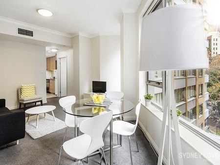 BOUTIQUE DESIGNER ABODE | Furnished - Photo 4