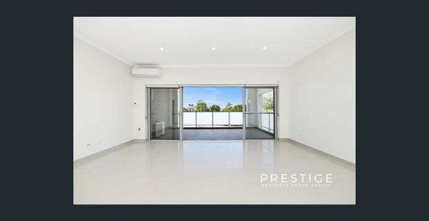 CONEVNIENTLY LOCATED OVERSIZED APARTMENT - Photo 1