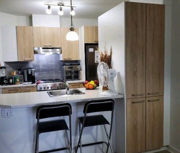 LOGEMENT 3½ BORD DU FLEUVE - Photo 2