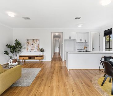 Modern Comfort, Low-Maintenance Living in a Prime Coastal Location - Photo 4