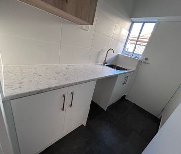 Newly Renovated 2 Bedroom Unit in a Quiet Group! - Photo 1