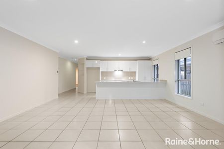 Beautifully Lanscaped Coomera Family Home - Photo 2