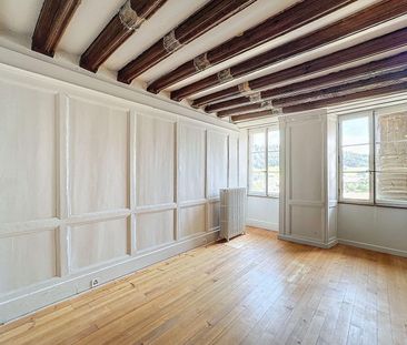 Appartement de 4 pièces de 173m2 avec poutres apparentes - Photo 5