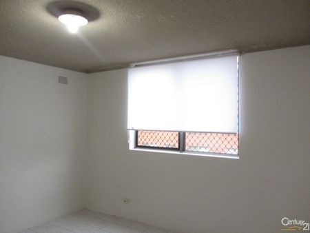 Spacious Second Floor Unit - Photo 2