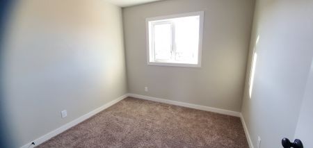 Duplex in Blackfalds with GARAGE and PET FRIENDLY! - Photo 3