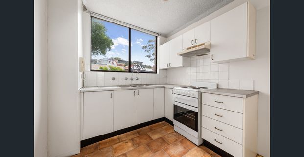 Elevated two-bedroom apartment with water views - Photo 1