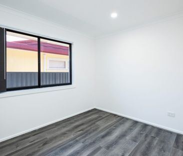 FULLY RENOVATED COASTAL HOME NEAR THE BROADWATER - Photo 6