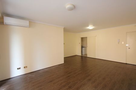 Neat & Tidy Unit with Access to Pool & Tennis Court - Photo 5