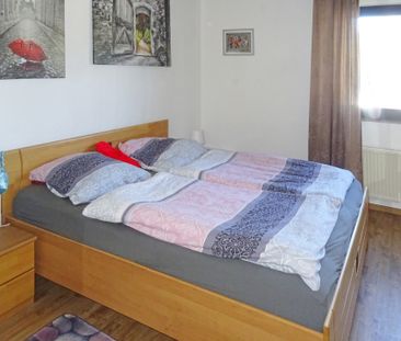 Großzügige Dachgeschosswohnung mit Balkon und schöner Aussicht! - Foto 3