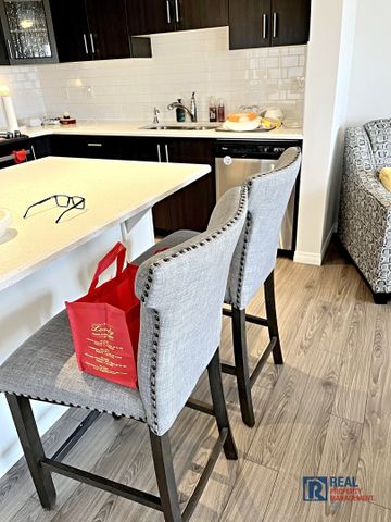 10799 Cityscape Drive NE | Townhouse | 3-bedroom, 2.5-bathroom | Double Garage - Photo 5