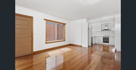 Modern 3-Bedroom Home in Great Location - Photo 2