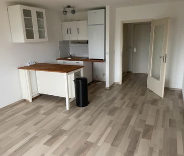 Charmante 1-Zimmer-Wohnung, Einbauküche, Balkon, Tiefgaragenplatz - Foto 2