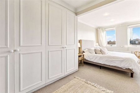 Neutrally decorated two bedroom, split level apartment off the Wandsworth Bridge Road. - Photo 3