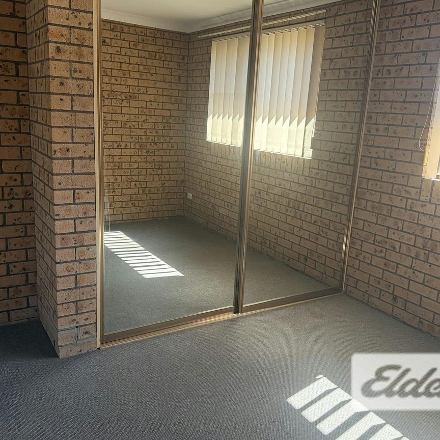 PRIVATE COURTYARD + EASY CARE LIVING - Photo 1